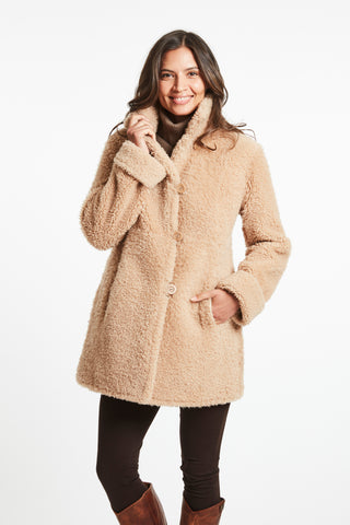 REVERSIBLE CURLY SHEARLING TOPPER in Beige with Model shot