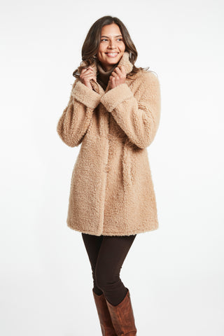 REVERSIBLE CURLY SHEARLING TOPPER in Beige with Model shot