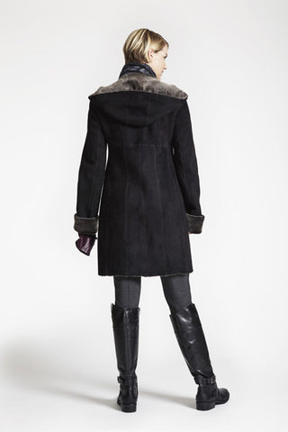 Back View of Fitted Shearling Coat With Zip Front And Hood in Soft Black