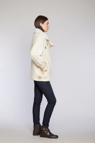 Side View of Plush Shearling Moto Jacket with Generous collar