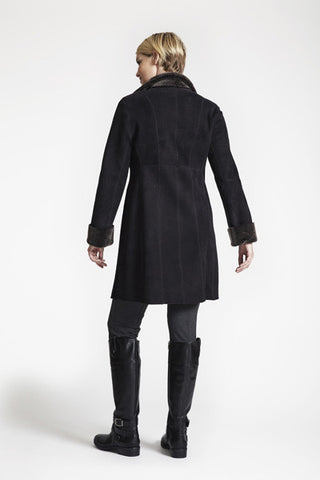 Back View of Shearling Ruffle Tuxedo Trim Jacket in Soft Black with Stand Collar