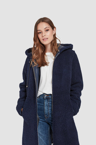 CURLY SHEARLING REVERSES TO LEATHER on both sides with Model shot