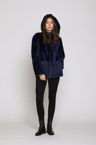 REVERSIBLE TWO TEXTURE SHEARLING HOODED JACKET in Indigo with hood on