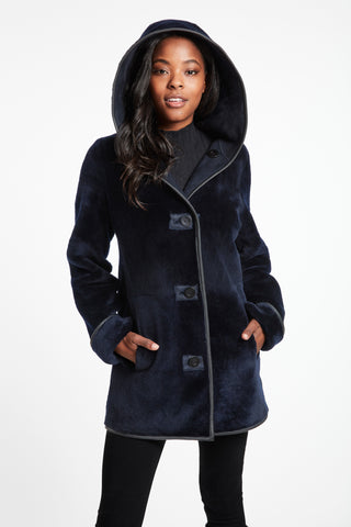Essential Merino Shearling in Navy with hood on