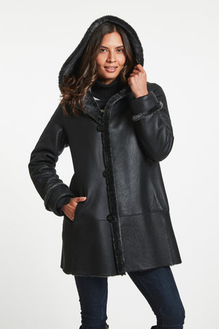 A-LINE REVERSIBLE SHEARLING TOPPER in Charco with hood on