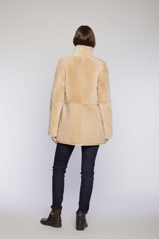 Back View of REVERSIBLE SHEARLING CITY PARKA in Beige with Stand Collar