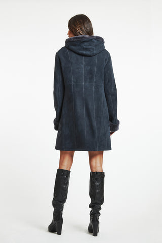 Back View of SPANISH MERINO SHEARLING HOODED COAT in Navy with Snug hood