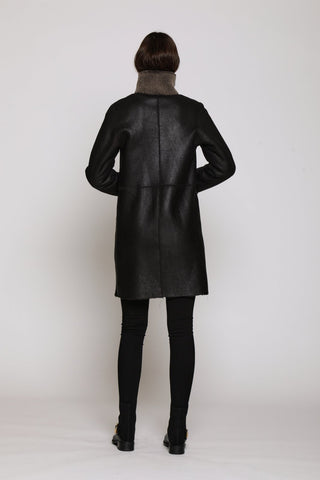 Back View of REVERSIBLE SHEARLING COAT REVERSES TO SOFT NAPPA SHEARLING in Black with Stand Collar