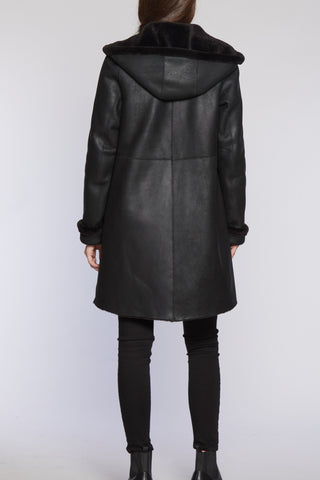 Back View of Hooded Reversible Shearling Coat Shown In Granite Nappa with Cozy hood
